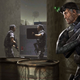 Splinter Cell artwork depicting Sam Fisher peeking behind a wall, listening to two gun-toting soldiers discuss something.